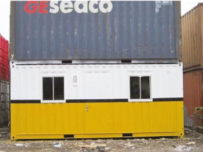 Office container putih dan kuning di area depo